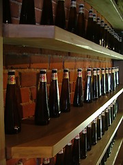 Image showing row of beer bottles