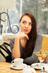 Image showing Young thoughtful woman