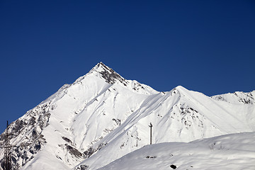 Image showing Snowy mountains and blue clear sky in nice day