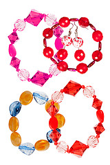 Image showing A set of handmade bracelets made of glass on a white background.