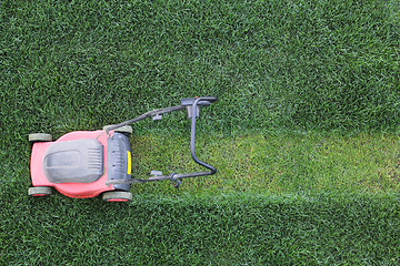 Image showing Grass cutter at the lawn