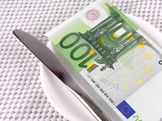 Image showing euro money on plate with knife