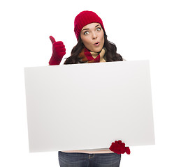 Image showing Excited Girl Holds Blank Sign and gives Thumbs Up Gesture