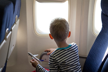 Image showing boy in the plane