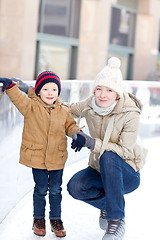 Image showing family ice skating