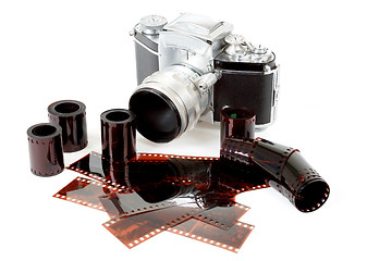 Image showing analog vintage SLR camera and color negative films