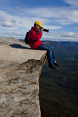 Image showing Tourist or photographer taking phots mountain landscape