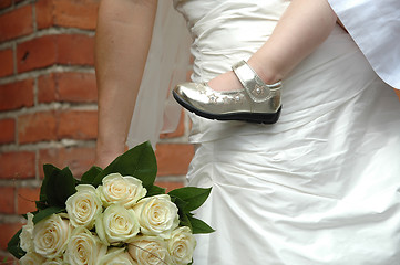 Image showing Bride, child and flowers