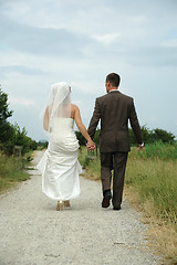 Image showing Wedding couple walking