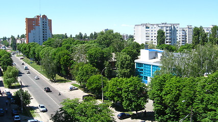 Image showing Panorama of city with multystorey houses and trees