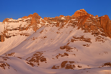 Image showing Sunrise in snowy mountains