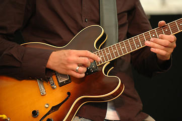 Image showing Man playing guitar