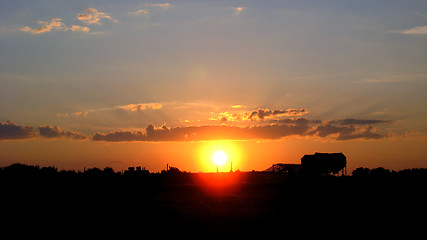 Image showing Dark summer decline above the river