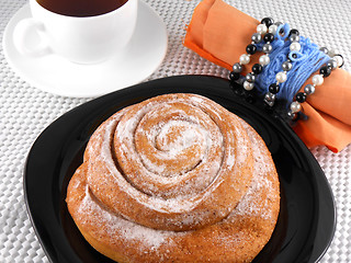 Image showing tea with cake and gift bow