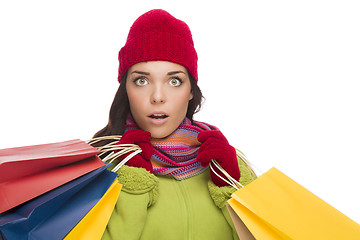 Image showing Mixed Race Woman Wearing Hat and Gloves Holding Shopping Bags