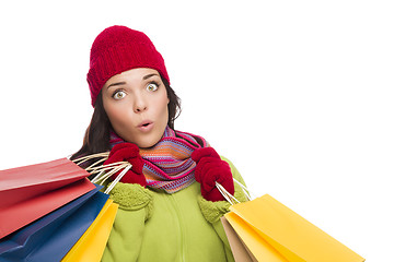 Image showing Mixed Race Woman Wearing Hat and Gloves Holding Shopping Bags