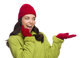 Image showing Mixed Race Woman Wearing Hat and Gloves Gesturing to Side