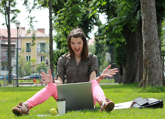 Image showing Happy Young Woman on a Laptop