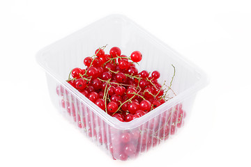 Image showing pile berries of red currant on white background