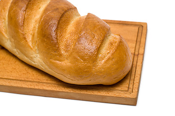 Image showing bread on breadboard isolated on white background