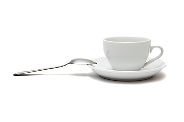 Image showing white cup with spoon and saucer isolated on white background