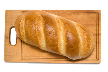 Image showing bread on breadboard isolated on white background