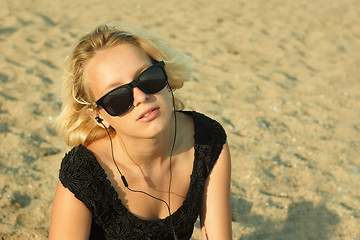 Image showing Teenage girl on the sandy beach