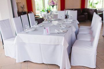 Image showing Tables decorated with flowers