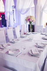 Image showing Tables decorated with flowers