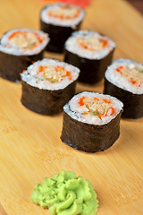 Image showing sushi rolls with tobico and pancake