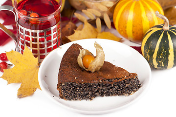 Image showing poppy pie, autumn leaves and pumpkins