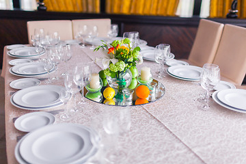 Image showing tables decorated with flowers