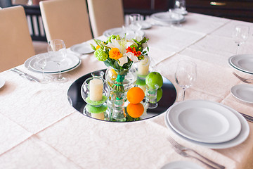 Image showing tables decorated with flowers