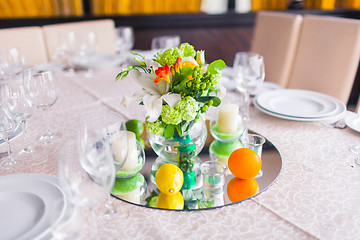 Image showing tables decorated with flowers and fruit