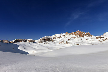 Image showing Snow plateau and blue sky in sunny spring day