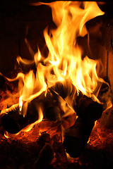 Image showing Flames dancing in fireplace