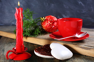 Image showing Gingerbread, candle and Christmas ball.