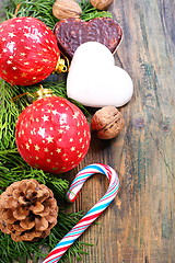 Image showing Christmas balls, cookies and nuts.