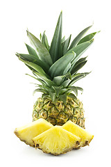 Image showing Ripe pineapple with slices