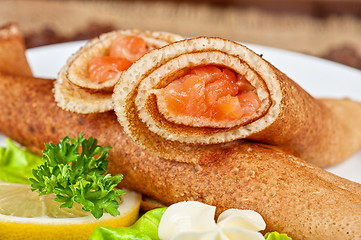 Image showing Pancakes with salmon