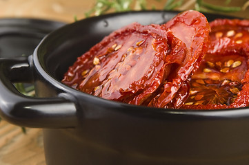 Image showing Sun dried tomatoes with olive oil