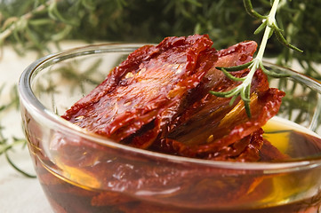 Image showing Sun dried tomatoes with olive oil