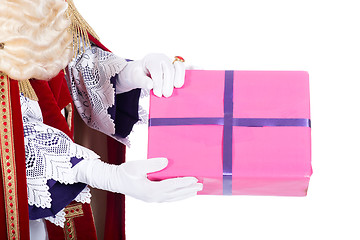 Image showing Sinterklaas is giving a present