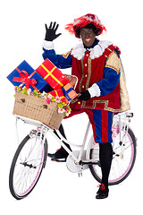 Image showing Zwarte Piet on a bike with presents