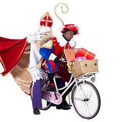 Image showing Zwarte Piet and Sinterklaas on a bike