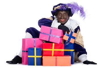 Image showing Zwarte Piet with a lot of presents