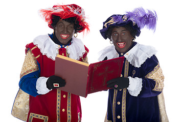 Image showing Zwarte Piet and the book of Sinterklaas