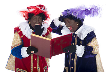 Image showing Zwarte Piet and the book of Sinterklaas