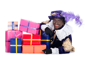 Image showing Zwarte Piet with a lot of presents