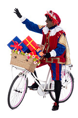 Image showing Zwarte Piet on a bike with presents